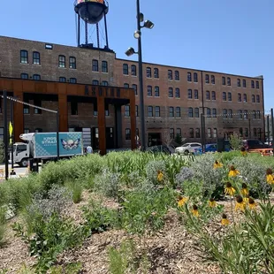 a building with a water tower in the background