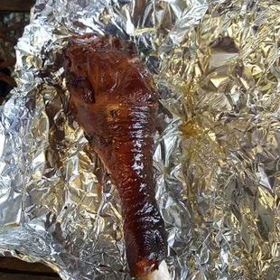 a piece of meat wrapped in foil