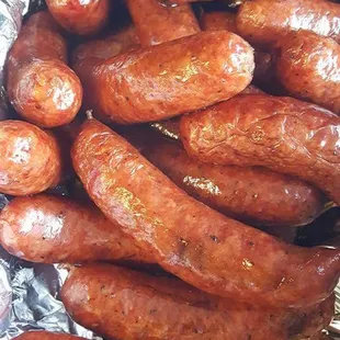 a bunch of sausages wrapped in foil
