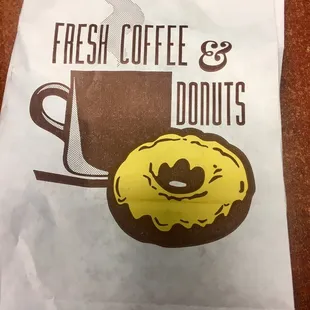 a cup of coffee and a donut