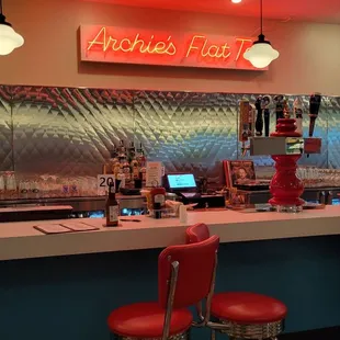diner counter with red chairs