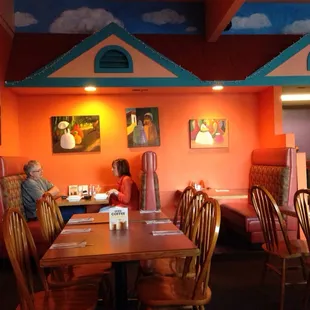 a woman and a man sitting at a table