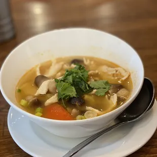a bowl of soup on a plate
