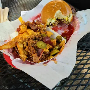 Double burger with chili cheese fries with bacon and jalapeños.