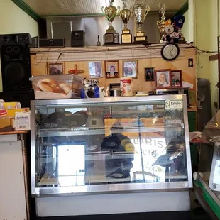 That's a big ass speaker pointed into the sales floor and a serious barred door on the right.