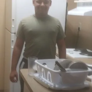 Son at Arden Extended Stay in kitchen