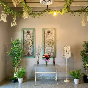 a table with a vase of flowers on it