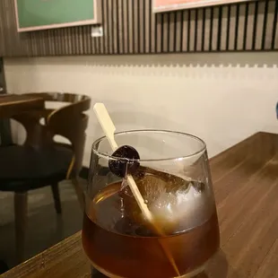  drink in a glass on a table