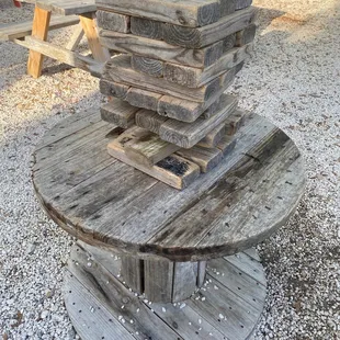 a stack of wooden tables