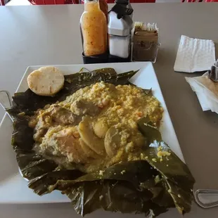 tamal tolimense (corn cake stuffed with chicken,  pork, and veggies)  #yummy