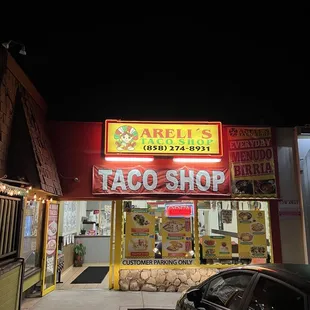 a taco shop at night