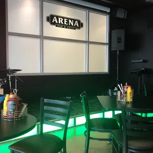 a bar with green lighting
