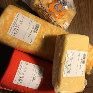 Edible souvenirs from this trip.  Curds are already gone, just started on the Brick Cheese.  CoJack and aged Gouda are longer term projects.