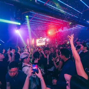 a crowd of people at a nightclub