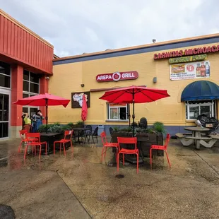 Outside. Storefront. Located at busy Plaza Fiesta on Buford Highway and Clairmont Road. Northwest corner of building. Outdoor patio seating.