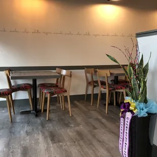 Tables in the dining area toward the front of the restaurant.