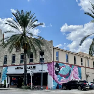 a mural of a woman on the side of a building