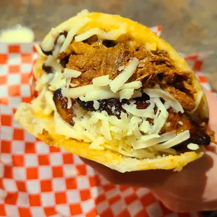 Pabellon (shredded beef, fried plantain with mozzarella cheese)