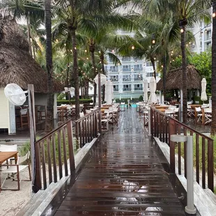 Tornado warning so nobody is out here. The bar cabana to the left, adult pool to the right, and the family pool directly forward.