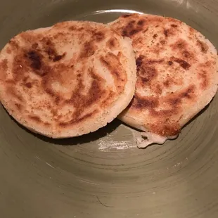 two flatbreads on a plate