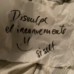 a piece of paper with a message written on it