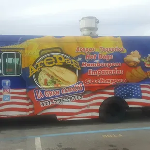 a food truck in a parking lot