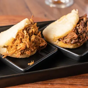 three plates of pulled pork sandwiches
