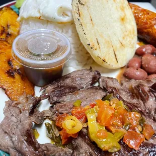 I ate Bandeja Paisa, a traditional Colombian dish.