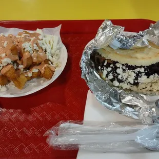 Yuca frita and a pabellon arepa.