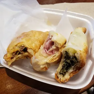 Left to right: bacon brisket, ham and cheese, spinach egg and cheese empanadas