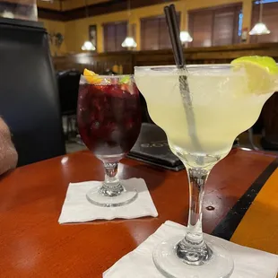two cocktails on a table