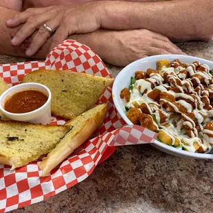 Buffalo Chicken Salad with garlic bread. Special Calzone in the oven and cheese for dessert