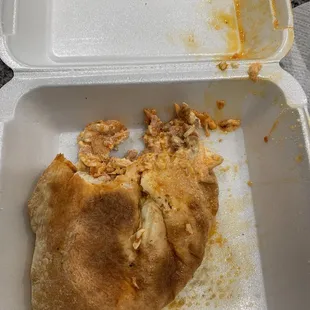 Buffalo chicken calzone (super greasy and undercooked) portion was already in the trash, couldn't even eat this