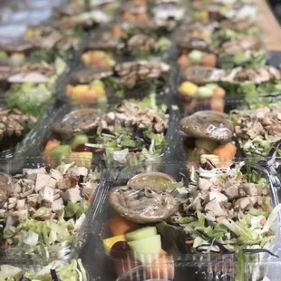 Boxed Chinese chicken with fruit salad and chocolate chip cookie!