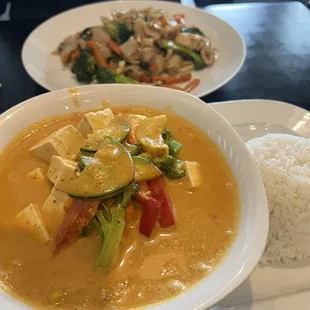 Panang curry with tofu in front. Drunken noodles with chicken in back.