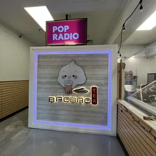 a sign for a pop radio station