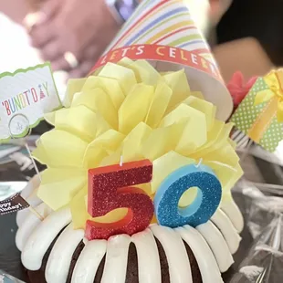 a birthday cake with candles and decorations