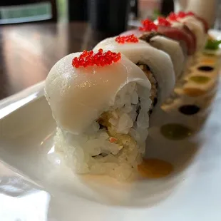 a sushi roll on a plate