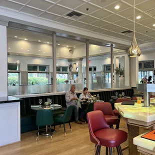 Small bar table seating directly behind the bar