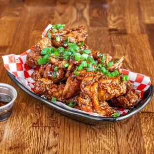 a plate of chicken wings