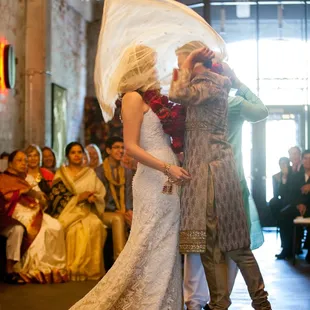 Ceremony in the round - Lobby of Aria - Photo by Bernadette Pollard