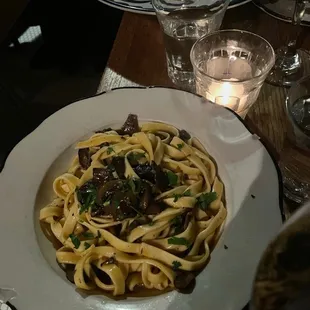 FETTUCCINE WITH WILD MUSHROOMS AND TRUFFLE OIL, LOBSTER RAVIOLI WITH VODKA SAUCE