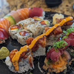 Rainbow Roll, ariaki roll,  Volcano, Godzilla (Left to right)