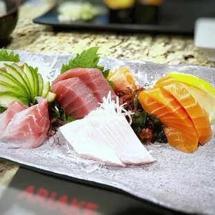 a plate of sushi on a table