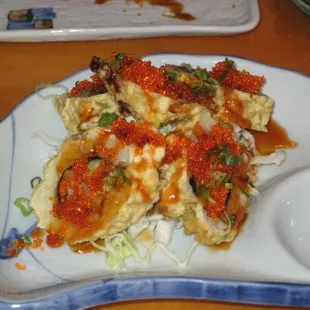 Dynamite: Yellowtail, salmon, tuna lightly deep fried