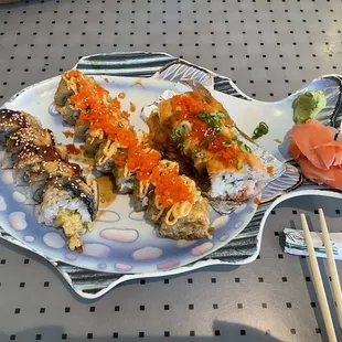 a plate of sushi on a table