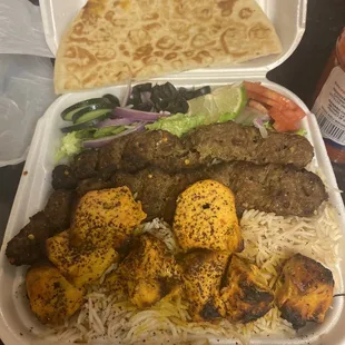 a meal in a styrofoam container