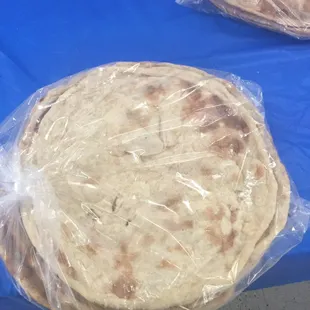 two tortillas wrapped in plastic