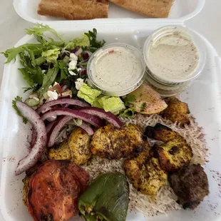 Chicken kabob plate with extra Ariana sauce.