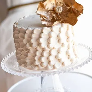 a cake with a flower on top